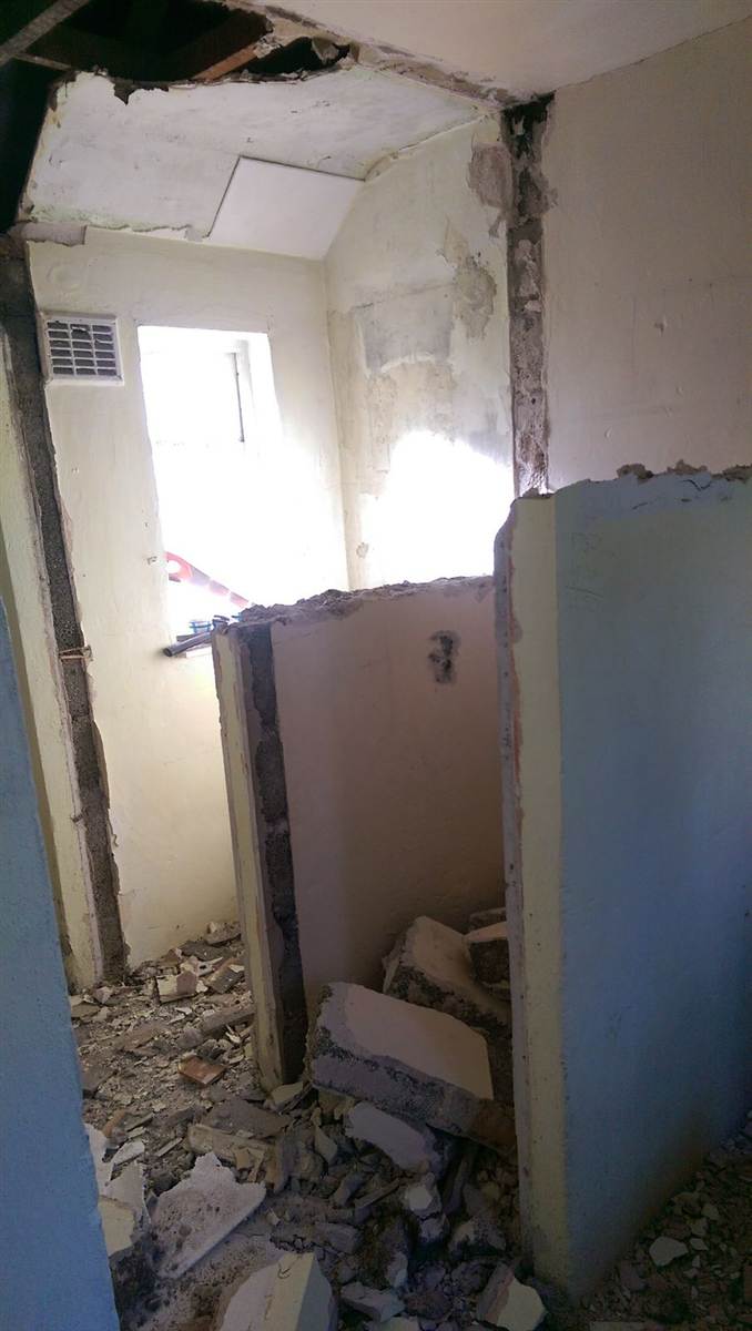 During — walls stripped back and partitions removed, starting from scratch